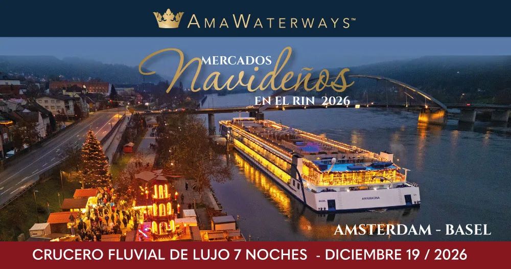 Crucero fluvial de lujo AmaMagna en el Rin, atracado junto a un Mercado Navideño iluminado. Itinerario de 7 noches de Ámsterdam a Basilea, diciembre de 2026.