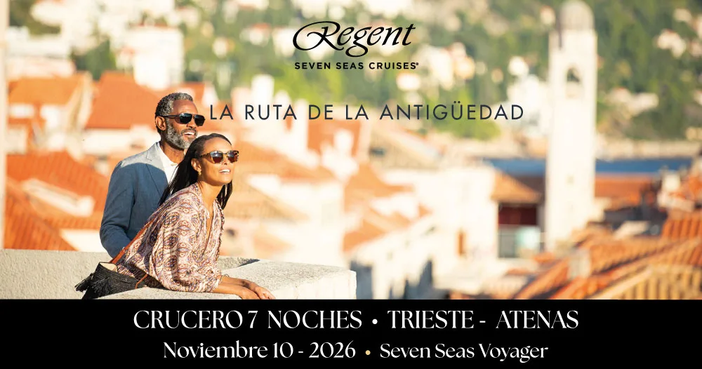 Viajeros disfrutando de vistas panorámicas de una ciudad mediterránea durante un crucero de lujo Seven Seas Voyager desde Trieste hasta Atenas en noviembre de 2026.