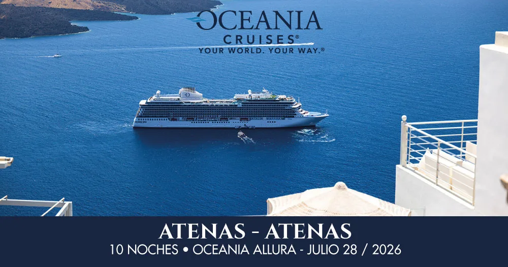 Crucero Oceania Allura navegando frente a las costas de Grecia con vistas de edificios blancos y mar azul, en itinerario desde Atenas en julio de 2026.