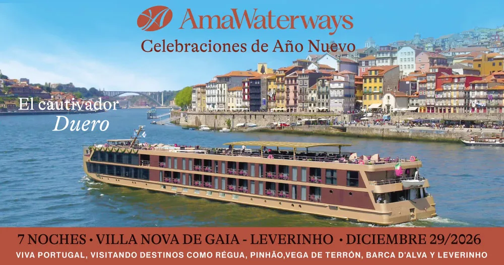 AmaDouro navegando por el río Duero frente a la ciudad de Oporto, en un crucero fluvial de 7 noches desde Vila Nova de Gaia hasta Leverinho con salida el 29 de diciembre de 2026.